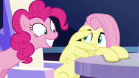 Fluttershy cowers away from Pinkie S6E1
