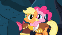 Pinkie Pie and Applejack hugging S2E11