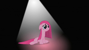 Pinkie surrounded by darkness under a cone of light S01E25