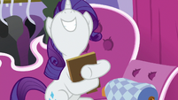 Rarity hugs photo of her and Sweetie Belle S7E6
