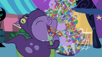 Spike shoveling candy into his mouth S2E4