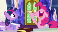 Pinkie Pie holding a scroll from Yakyakistan S7E11