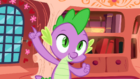 Spike holding up a number 1 claw S01E24