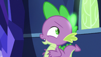 Spike looking at his glowing scales S7E15