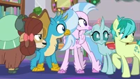 Young five looking over at Smolder S8E16