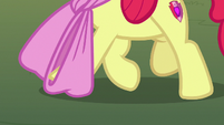 Apple Bloom's hoof gets caught in her oversized bow S7E9