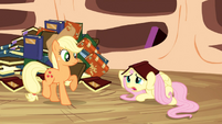 Fluttershy hides under book S3E05