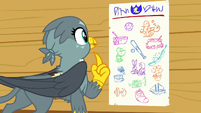 Gabby looking at the cutie mark chart S6E19