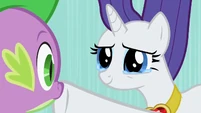 Rarity covers Spike's mouth with her hoof, as she has tears and a small smile. (The tears says it all)