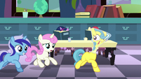 First of all, that's a flask, not a beaker. Second of all, how did her head end up in there? Third, Minuette has braces