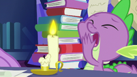 Spike yawning and holding a candlestick S7E25