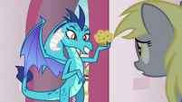 Princess Ember holding Derpy's muffin S7E15