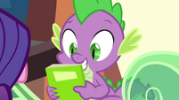 Spike holding new comic S4E22