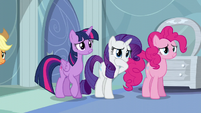 Twilight, Rarity, and Pinkie back away from Rainbow S5E5