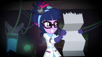 Twilight Sparkle smiling at the graph data SS5