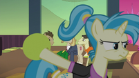 Bowling pony about to throw ball S5E9