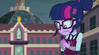 Twilight looking down at her amulet EG3