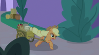 Applejack pulling a cart of baking materials S9E17