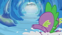 Spike sliding into a snowy cavern S6E16