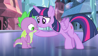 Twilight with hoof under Spike's chin S4E24