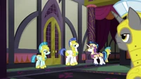 Shining Armor walks through guarded corridor S9E4