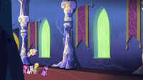 Twilight and friends walking through the castle S5E3