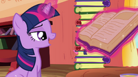 Twilight levitating the book to her view S3E09