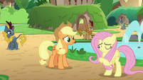 Fluttershy beckons Applejack to follow S8E23