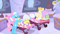 Lotus, giving Fluttershy a massage.