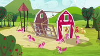 Pinkie Pie clones surrounding the barn S3E03