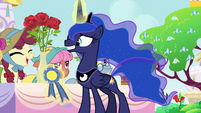 Luna about to award Hilly Hooffield's roses S7E10