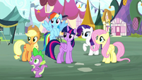 Main ponies and Spike look toward Pinkie S8E18