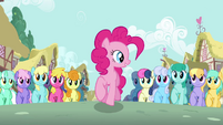 Pinkie Pie marching with crowd S2E18