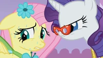 Rarity forcing Fluttershy to tell her what is wrong.