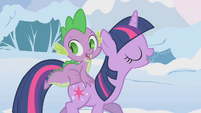 Twilight singing with Spike on her back S1E11