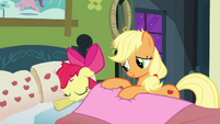 Letting Apple Bloom, sleep peacefully in her bed.