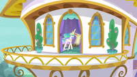 Balcony view of Celestia writing a list S9E13