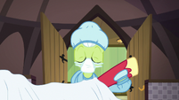 Granny Smith holding up Big Mac's hoof S6E23