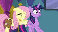 Fluttershy pushing Twilight toward the door S7E20