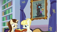 Students studying in the school library S8E15