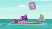 Twilight and Spike floating in the sea S9E5