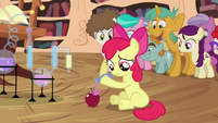 Apple Bloom pouring potion on apple S4E15
