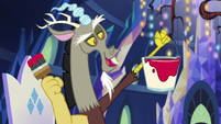 Discord holding paint can and paintbrush S6E17