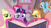 Mane Six looking at the EEA guidebook S8E1