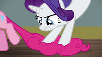 Rarity stops Pinkie Pie by the tail S6E12
