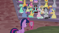 Twilight addressing right side of the crowd S9E17