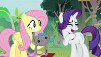 Rarity with an embarrassed side smirk S8E4