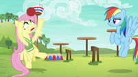 Fluttershy struggles to grab the softball S6E18