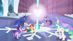 Starlight, Twilight, Luna, Celestia, and Sunburst look at the glowing Crystal Heart S6E2