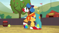 Trouble Shoes steps onto a beach ball S5E6